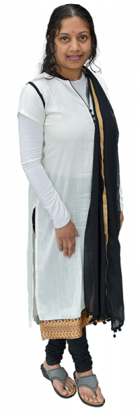 Nivedita Nagachar standing facing the camera.